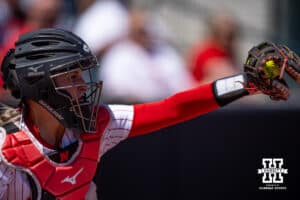 Nebraska Cornhusker Ava Bredwell (24) catches the ball after a pitch against the Maryland Terrapins in the fifth inning during a college softball game on Sunday, May 4, 2025 in Lincoln, Nebraska. Photo by John S. Peterson.