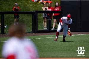Nebraska Cornhusker Abbie Squier (8) scoops up the ball against the Maryland Terrapins in the fifth inning during a college softball game on Sunday, May 4, 2025 in Lincoln, Nebraska. Photo by John S. Peterson.