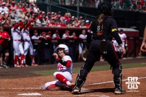 Nebraska Cornhusker Lauren Camenzind (2) slides a home for a run against the Maryland Terrapins in the second inning during a college softball game on Sunday, May 4, 2025 in Lincoln, Nebraska. Photo by John S. Peterson.