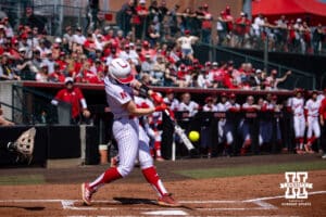 Nebraska Cornhusker Ava Kuszak (7) doubles bringing a run in against the Maryland Terrapins in the first inning during a college softball game on Sunday, May 4, 2025 in Lincoln, Nebraska. Photo by John S. Peterson.