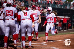 Nebraska Cornhusker Jordyn Bahl (98) runs home to celebrating her home run in the first inning during a college softball game on Sunday, May 4, 2025 in Lincoln, Nebraska. Photo by John S. Peterson.
