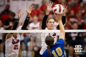 Nebraska Cornhusker Skyler Pierce (21) and Andi Jackson defend against South Dakota State Jackrabbit outside hitter Sylvie Zgonc (10) during the spring match on Saturday, May 3, 2025 in Ord, Nebraska. Photo by John S. Peterson