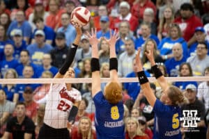 Nebraska Cornhusker Harper Murray (27)tips the ball over South Dakota State Jackrabbit Madison Burr (8) and Rylee Martin during the sping march on Saturday, May 3, 2025 in Ord, Nebraska. Photo by John S. Peterson