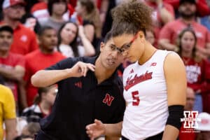 Nebraska Cornhuskers assistant coach Jaylen Reyes talks to Nebraska Cornhusker Rebekah Allick (5) against the South Dakota State Jackrabbits during the spring match on Saturday, May 3, 2025 in Ord, Nebraska. Photo by John S. Peterson