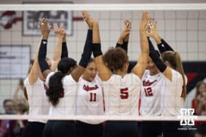 Nebraska Cornhuskers huddle up before taking on the South Dakota State Jackrabbits on Saturday, May 3, 2025 in Ord, Nebraska. Photo by John S. Peterson