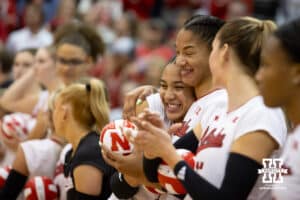 Nebraska Cornhusker Taylor Landfair (12) gives Teraya Sigler a hug before the introductions during the match against the South Dakota State Jackrabbits on Saturday, May 3, 2025 in Ord, Nebraska. Photo by John S. Peterson