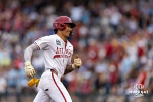 Arkansas Razorback infielder Wehiwa Aloy (9) runs the bases after hitting a two-run home run in the first inning against the UCLA Bruins during the College World Series on Tuesday, June 17, 2025 in Omaha, Nebraska. Photo by John S. Peterson.