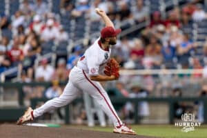 Arkansas Razorback pitcher Zach Root (33) throws a pitch in the first inning against the UCLA Bruins during the College World Series on Tuesday, June 17, 2025 in Omaha, Nebraska. Photo by John S. Peterson.