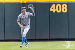 UCLA Bruin outfielder Payton Brennan (11) making a catch for an out against the LSU Tigers in the second inning during the College World Series on Monday, June 16, 2025 in Omaha, Nebraska. Photo by John S. Peterson.