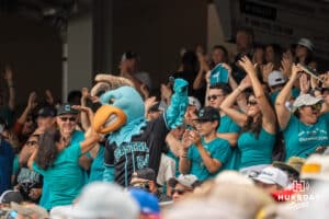 Coastal Carolina Chanticleers fans cheer during a baseball game Thursday June 18th 2025 in Omaha Nebraska. Photo by Brandon Tiedemann.