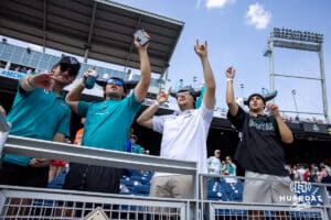 Coastal Carolina Chanticleers fans celebrating the win over the Arizona Wildcats during the College World Series on Friday, June 13, 2025 in Omaha, Nebraska. Photo by John S. Peterson.