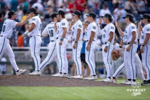 Coastal Carolina Chanticleers celebrate the win over the Arizona Wildcats during the College World Series on Friday, June 13, 2025 in Omaha, Nebraska. Photo by John S. Peterson.