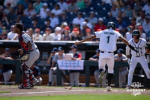 Coastal Carolina Chanticleer outfielder Sebastian Alexander (1) scores a run against the Arizona Wildcats in the eighth inning during the College World Series on Friday, June 13, 2025 in Omaha, Nebraska. Photo by John S. Peterson.