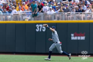 Arizona Wildcat outfielder Brendan Summerhill (4) makes an out against the Coastal Carolina Chanticleers in the fifth inning during the College World Series on Friday, June 13, 2025 in Omaha, Nebraska. Photo by John S. Peterson.