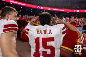 Nebraska Cornhusker Dylan Raiola (15) celebrates the win over the Cincinnati Bearcats with the fans as he heads to the locker room during the football game on, Thursday, August 28, 2025 in Kansas City, MO. Photo by John S. Peterson.