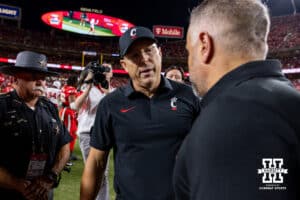 Nebraska Cornhusker head coach Matt Rhule shakes hands with Cincinnati Bearcat head coach Scott Satterfield after the college football game on Thursday, August 28, 2025, in Kansas City, MO. Photo by John S. Peterson.