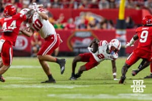 Nebraska Cornhusker Jacory Barney Jr. (2) runs with the ball against the Cincinnati Bearcats during a college football game Thursday, August 28, 2025 in Kansas City, MO. Photo by John S. Peterson.