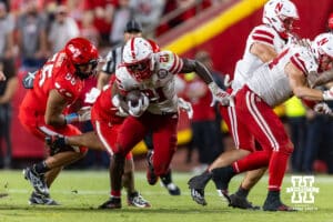 Nebraska Cornhusker Emmett Johnson (21) runs with the ball against the Cincinnati Bearcats during a college football game on Thursday, August 28, 2025, in Kansas City, MO. Photo by John S. Peterson.