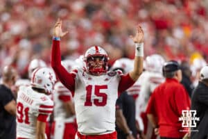 Nebraska Cornhusker Dylan Raiola (15) signals touchdown while watching the review during a college football game against the Cincinnati Bearcats Thursday, August 28, 2025 in Kansas City, MO. Photo by John S. Peterson.