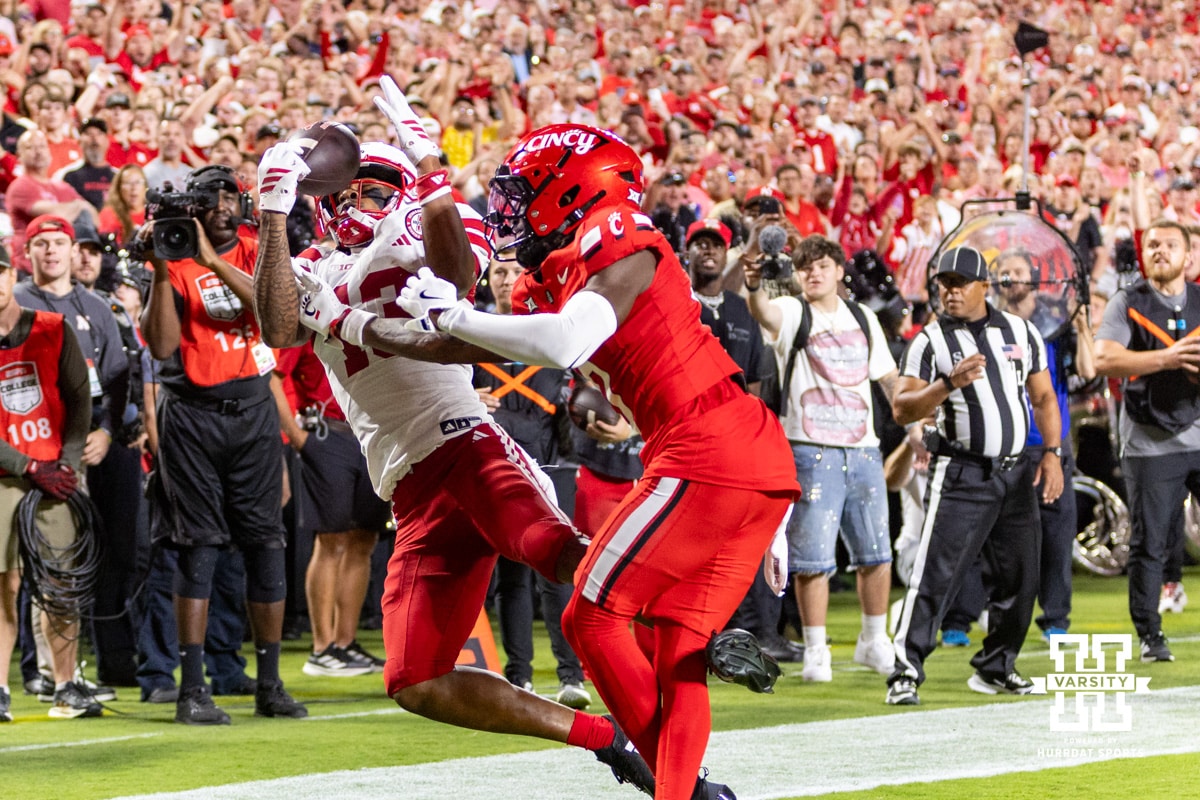 Nebraska Football v Cincinnati | August 28, 2025 Nebraska Cornhusker Nyziah Hunter (13) makes a catch for a touchdown against Cincinnati Bearcat cornerback Matthew McDoom (0) at the end of the second quarter during a college football game Thursday, August 28, 2025 in Kansas City, MO. Photo by John S. Peterson.