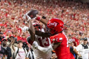 Nebraska Cornhusker Nyziah Hunter (13) makes a catch for a touchdown against Cincinnati Bearcat cornerback Matthew McDoom (0) at the end of the second quarter during a college football game Thursday, August 28, 2025 in Kansas City, MO. Photo by John S. Peterson.