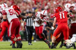 Nebraska Cornhusker Emmett Johnson (21) runs with the ball against the Cincinnati Bearcats in the second quarter during a college football game Thursday, August 28, 2025 in Kansas City, MO. Photo by John S. Peterson.