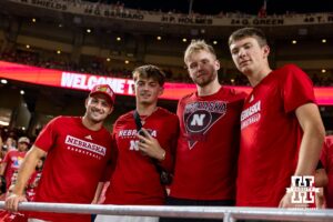 Nebraska Cornhuskers men's basketball team members Sam Hoiberg, Connor Essegian, Rienk Mast, and Pryce Sandfort watching the game against the Cincinnati Bearcats during a college football game Thursday, August 28, 2025 in Kansas City, MO. Photo by John S. Peterson.