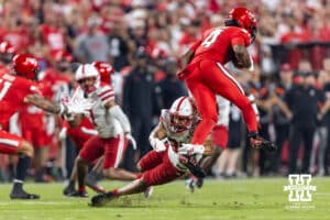 Nebraska Cornhusker Donovan Jones (37) tries to tackle Cincinnati Bearcat wide receiver Cyrus Allen (4) in the first quarter during a college football game Thursday, August 28, 2025 in Kansas City, MO. Photo by John S. Peterson.