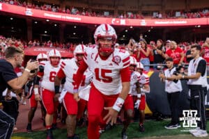 Nebraska Cornhusker Dylan Raiola (15) leads the Huskers on to the field for pre-game against the Cincinnati Bearcats during a college football game Thursday, August 28, 2025 in Kansas City, MO. Photo by John S. Peterson.