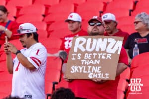 Nebraska Cornhusker fan holds a sign before the college football game against the Cincinnati Bearcats, Thursday, August 28, 2025 in Kansas City, MO. Photo by John S. Peterson.
