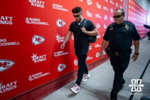 Nebraska Cornhusker Dylan Raiola (15) escorted to the locke room before the college football game against the Cincinnati Bearcats, Thursday, August 28, 2025 in Kansas City, MO. Photo by John S. Peterson.