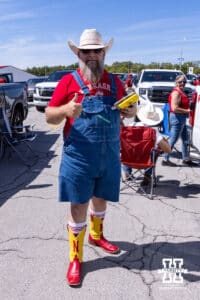 Nebraska Cornhuskers fan tailgating waitng for the gates to open before a college football game between the Nebraska Cornhuskers and the Cincinnati Bearcats, Thursday, August 28, 2025 in Kansas City, MO. Photo by John S. Peterson.