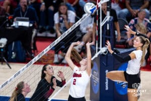 Nebraska Cornhusker Bergen Reilly (2) sets the ball for Andi Jackson (15) against the Stanford Cardinals in the second set during the AVAC First Serve volleyball match on Sunday, August 24, 2025 in Lincoln, Nebraska. Photo by John S. Peterson.