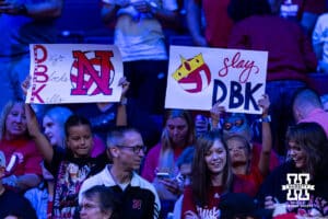 Nebraska Cornhuskers fans holding signs before the match against the Stanford Cardinals during the AVAC First Serve volleyball match on Sunday, Aug. 24, 2025 in Lincoln, Nebraska. Photo by John S. Peterson.