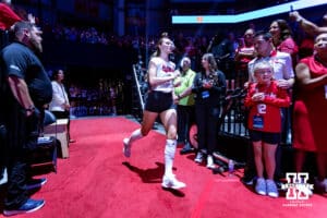 Nebraska Cornhusker Bergen Reilly (2) runs out to the court when introduced before taking on the Pittsburgh Panthers during the AVAC Showcase volleyball match on Friday, Aug. 22, 2025, in Lincoln, Nebraska. Photo by John S. Peterson.
