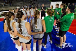 Millard West coach Jesse Wessel comes together with his team during the Battle at the Buell, Thursday, August 21st, 2025, Millard, Nebraska. Photo by Braden Cochran.