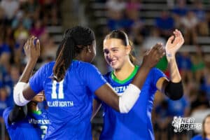 Two Millard North players celebrate after a point during the Battle at the Buell, Thursday, August 21st, 2025, Millard, Nebraska. Photo by Braden Cochran.