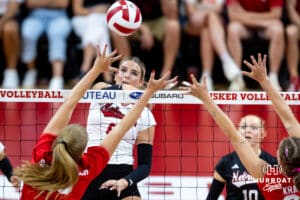 Nebraska Cornhusker Kenna Cogill (8) spikes the ball against Nebraska alumnus Callie Schwarzenbach (25) and Nebraska alumnus Lindsay Krause (22) in the third set during the Nebraska alumni match on Saturday, Aug. 16, 2025 in Lincoln, Nebraska. Photo by John S. Peterson.