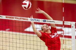 Nebraska alumnus Kelly (Hunter) Natter (3) dumps the ball against the Nebraska Cornhuskers for a point in the second set during the Nebraska alumni match on Saturday, Aug. 16, 2025 in Lincoln, Nebraska. Photo by John S. Peterson.