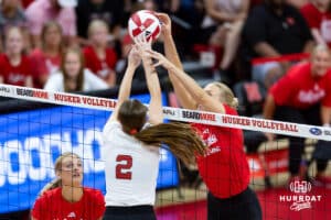 Nebraska Cornhusker Bergen Reilly (2) and Nebraska alumnus Lauren Stivrins (26) battle at the net in the first set during the Nebraska alumni match on Saturday, Aug. 16, 2025 in Lincoln, Nebraska. Photo by John S. Peterson.