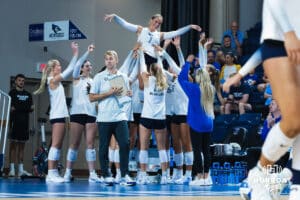 The Creighton Volleyball team raises Alivia Hausmann for a celebration during the Creighton Volleyball Exhibition game vs Colorado State on August 16th, 2025 in Omaha, Nebraska. Photo by Drew Balus