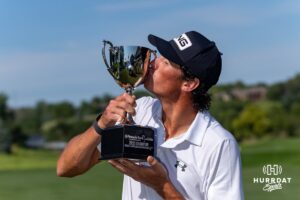 Christo Lamprecht kisses the trophy after winning the Pinnacle Bank Championship on Sunday, Aug. 10, 2025 in Elkhorn, Nebraska. Photo by John S. Peterson.