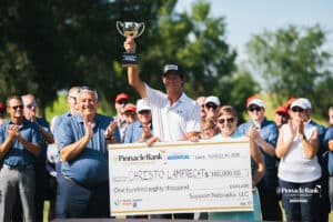 Christo Lamprecht being presented the trophy during the Pinnacle Bank Championship, Sunday, August 10th, 2025, in Omaha, Nebraska. Photo by Nick Barajas.