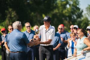 Christo Lamprecht is being presented the trophy during the Pinnacle Bank Championship, Sunday, August 10th, 2025, in Omaha, Nebraska. Photo by Nick Barajas.