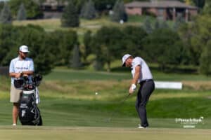 Robby Shelton chips onto the 18th green during the Pinnacle Bank Championship on Sunday, Aug. 10, 2025, in Elkhorn, Nebraska. Photo by John S. Peterson.