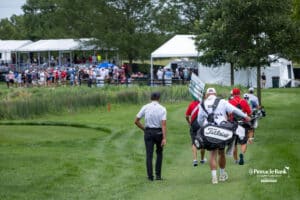 Peter Kuest and his caddie walking to the 17th green during the Pinnacle Bank Championship on Sunday, Aug. 10, 2025 in Elkhorn, Nebraska. Photo by John S. Peterson.