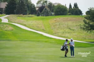 Austin Hitt and his caddy analyzing the green during the Pinnacle Bank Championship, Sunday, August 10th, 2025, in Omaha, Nebraska. Photo by Nick Barajas.
