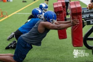 Marquise McIntyre-Dailey pushes the sled during Omaha North football practice on August 11th, 2025 in Omaha Nebraska. Photo by Brandon Tiedemann.