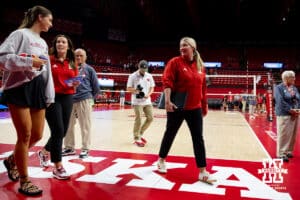 Nebraska Cornhusker head coach Dani BusBoom walks off the court with Merritt Beason during the Red/White Scrimmage on Saturday, Aug. 9, 2025 in Lincoln, Nebraska. Photo by John S. Peterson.