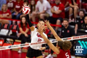 Nebraska Cornhusker Andi Jackson (15) spikes the ball against Rebekah Allick in the third set during the Red/White Scrimmage on Saturday, Aug. 9, 2025 in Lincoln, Nebraska. Photo by John S. Peterson.